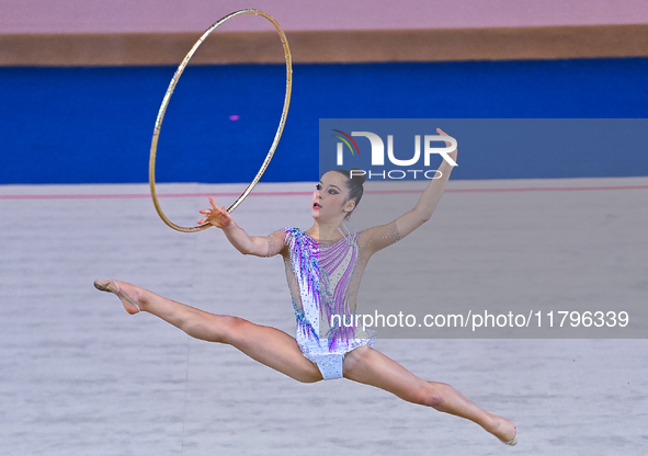 Alexandra Kirpichnikova of Germany performs the Hoop exercise during the International Rhythmic Gymnastics Tournament ''Sky Grace 2024'' at...