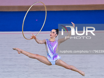 Alexandra Kirpichnikova of Germany performs the Hoop exercise during the International Rhythmic Gymnastics Tournament ''Sky Grace 2024'' at...