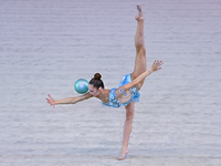 Alina Rechkina of Belarus performs the Ball exercise during the International Rhythmic Gymnastics Tournament ''Sky Grace 2024'' at Aspire Zo...