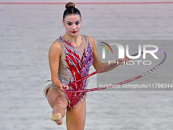 Andela Mazibrada of Serbia performs the Hoop exercise during the International Rhythmic Gymnastics Tournament ''Sky Grace 2024'' at Aspire Z...