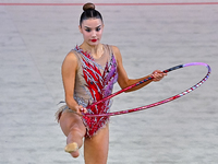 Andela Mazibrada of Serbia performs the Hoop exercise during the International Rhythmic Gymnastics Tournament ''Sky Grace 2024'' at Aspire Z...