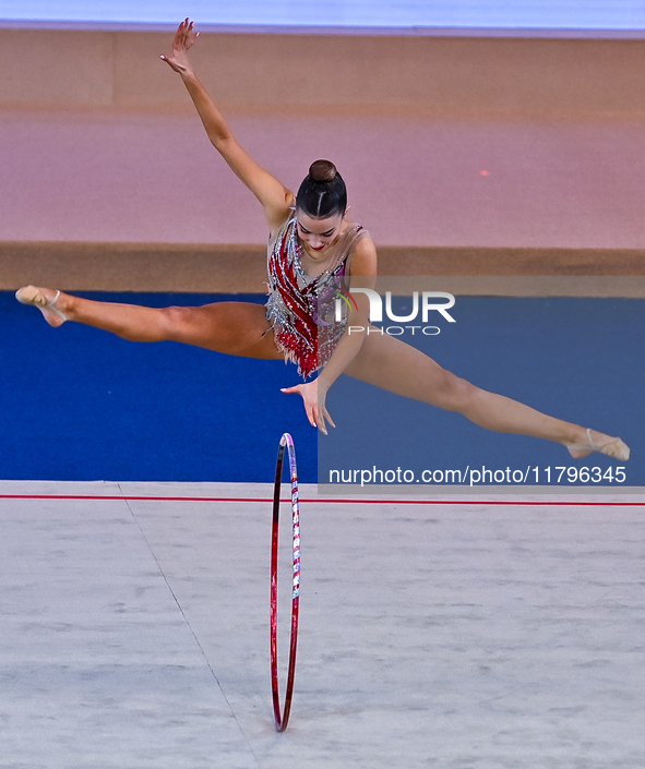 Andela Mazibrada of Serbia performs the Hoop exercise during the International Rhythmic Gymnastics Tournament ''Sky Grace 2024'' at Aspire Z...