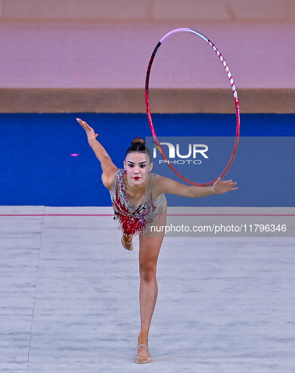 Andela Mazibrada of Serbia performs the Hoop exercise during the International Rhythmic Gymnastics Tournament ''Sky Grace 2024'' at Aspire Z...