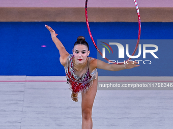 Andela Mazibrada of Serbia performs the Hoop exercise during the International Rhythmic Gymnastics Tournament ''Sky Grace 2024'' at Aspire Z...