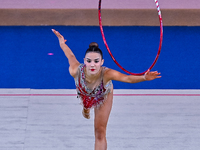 Andela Mazibrada of Serbia performs the Hoop exercise during the International Rhythmic Gymnastics Tournament ''Sky Grace 2024'' at Aspire Z...