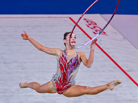 Andela Mazibrada of Serbia performs the Hoop exercise during the International Rhythmic Gymnastics Tournament ''Sky Grace 2024'' at Aspire Z...