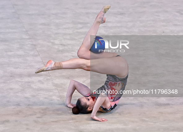 Hanna Kamenshchykava of Belarus performs the Hoop exercise during the International Rhythmic Gymnastics Tournament 'Sky Grace 2024' at Aspir...