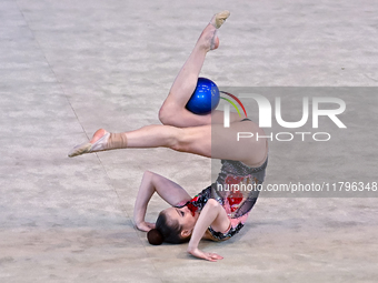 Hanna Kamenshchykava of Belarus performs the Hoop exercise during the International Rhythmic Gymnastics Tournament 'Sky Grace 2024' at Aspir...