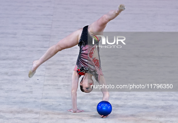 Hanna Kamenshchykava of Belarus performs the Hoop exercise during the International Rhythmic Gymnastics Tournament 'Sky Grace 2024' at Aspir...