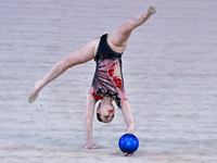 Hanna Kamenshchykava of Belarus performs the Hoop exercise during the International Rhythmic Gymnastics Tournament 'Sky Grace 2024' at Aspir...