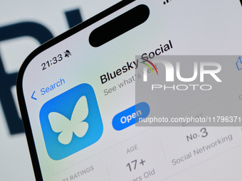 The Bleusky app logo is seen on an iPhone in this illustration photo taken in Warsaw, Poland on 20 November, 2024. (