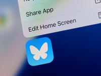 The Bleusky app logo is seen on an iPhone in this illustration photo taken in Warsaw, Poland on 20 November, 2024. (