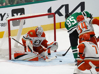 Matt Duchene #95 of the Dallas Stars makes a play against goalie Lukas Dostal #1 of the Anaheim Ducks during the NHL regular season match at...