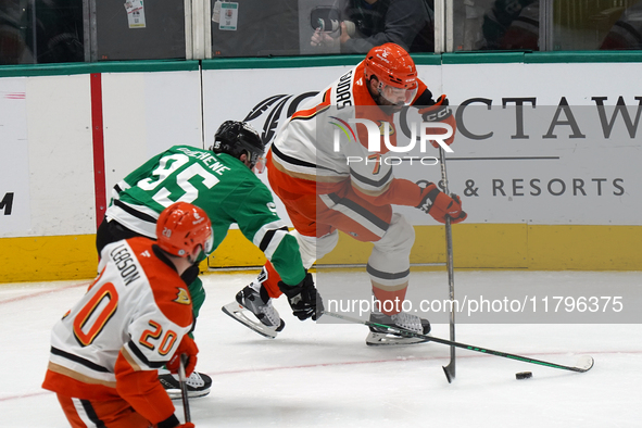 Radko Gudas #7 of the Anaheim Ducks skates on the ice with the puck against the Dallas Stars during the NHL regular season match at the Amer...