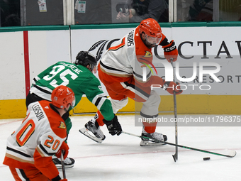 Radko Gudas #7 of the Anaheim Ducks skates on the ice with the puck against the Dallas Stars during the NHL regular season match at the Amer...