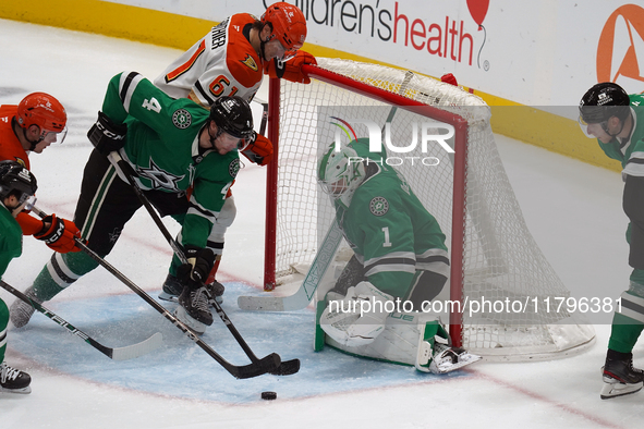 Miro Heiskanen #4 and Goalie Casey DeSmith #1 of the Dallas Stars defend the goal against the Anaheim Ducks during the NHL regular season ma...