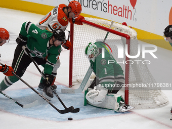 Miro Heiskanen #4 and Goalie Casey DeSmith #1 of the Dallas Stars defend the goal against the Anaheim Ducks during the NHL regular season ma...