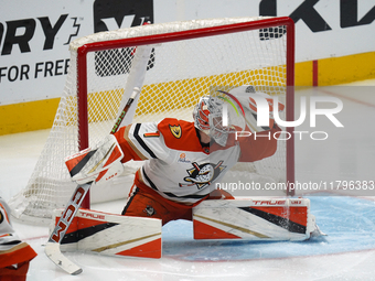 Lukas Dostal, the #1 goalkeeper of the Anaheim Ducks, defends a play against the Dallas Stars during the NHL regular season match at the Ame...