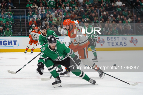 Mavrik Bourque #4 of the Dallas Stars blocks the shot of Brian Dumoulin of the Anaheim Ducks during the NHL regular season match at the Amer...