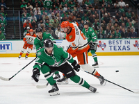 Mavrik Bourque #4 of the Dallas Stars blocks the shot of Brian Dumoulin of the Anaheim Ducks during the NHL regular season match at the Amer...