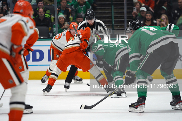 Wyatt Johnston #53 of the Dallas Stars battles for the puck against the Anaheim Ducks during the NHL regular season match at the American Ai...