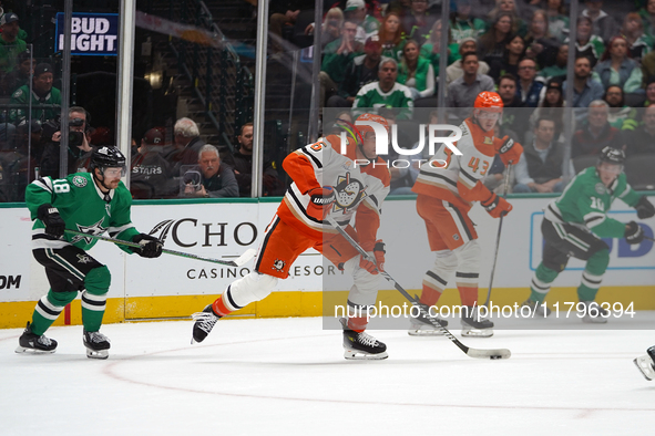 Brian Dumoulin #6 of the Anaheim Ducks skates on the ice with the puck against the Dallas Stars during the NHL regular season match at the A...