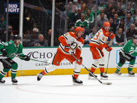 Brian Dumoulin #6 of the Anaheim Ducks skates on the ice with the puck against the Dallas Stars during the NHL regular season match at the A...