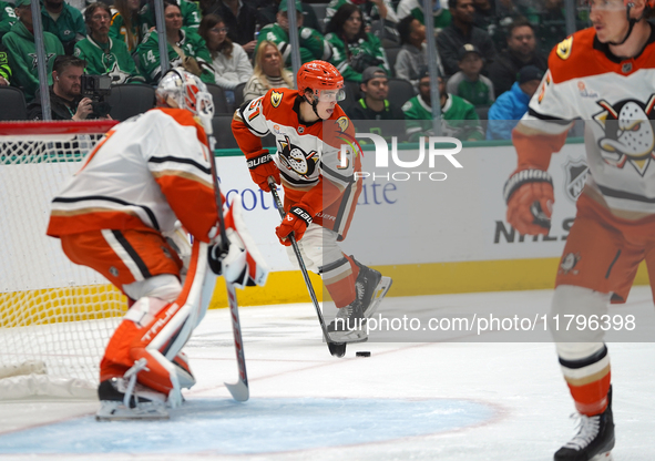 Olen Zellweger #51 of the Anaheim Ducks skates on the ice with the puck against the Dallas Stars during the NHL regular season match at the...