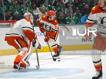 Olen Zellweger #51 of the Anaheim Ducks skates on the ice with the puck against the Dallas Stars during the NHL regular season match at the...