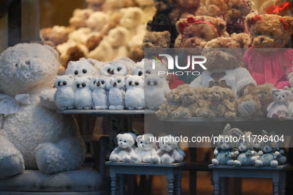 Plush toys are in a store window on the street in Krakow, Poland, on November 18, 2024. 