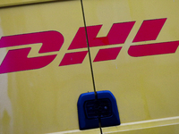 The DHL logo is on a delivery truck on the street in Krakow, Poland, on November 18, 2024. (