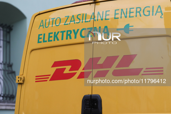 The DHL logo is on a delivery truck on the street in Krakow, Poland, on November 18, 2024. 