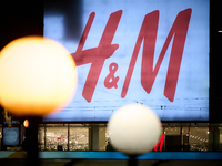 Advertisemetn for Hennis and Mauritz (H&M) shop is seen in Warsaw, Poland on 20 November, 2024. (