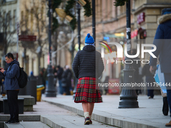 A man in a kilt is seen in the Old Town center in Warsaw, Poland on 18 November, 2024. On Monday Poland faces Scotland in the Nations League...