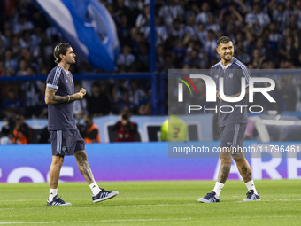 Argentina's Rodrigo de Paul and Leandro Paredes stand before the 2026 FIFA World Cup South American qualifiers football match between Argent...