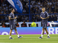 Argentina's Rodrigo de Paul and Leandro Paredes stand before the 2026 FIFA World Cup South American qualifiers football match between Argent...