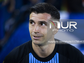 Emiliano Martinez of Argentina stands before the 2026 FIFA World Cup South American qualifiers football match between Argentina and Peru at...