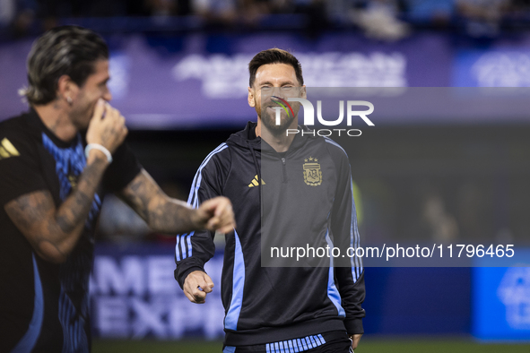 Argentina's Lionel Messi laughs before the 2026 FIFA World Cup South American qualifiers football match between Argentina and Peru at the La...