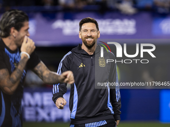 Argentina's Lionel Messi laughs before the 2026 FIFA World Cup South American qualifiers football match between Argentina and Peru at the La...