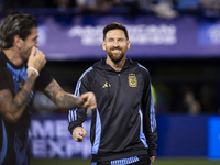 Argentina's Lionel Messi laughs before the 2026 FIFA World Cup South American qualifiers football match between Argentina and Peru at the La...