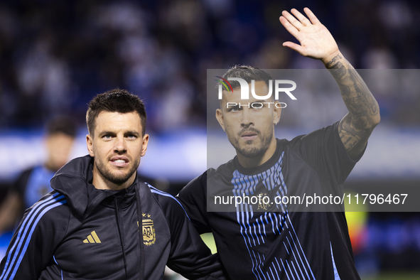 Argentina's Giovani Lo Celso and Leandro Paredes stand before the 2026 FIFA World Cup South American qualifiers football match between Argen...