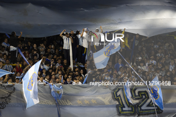 Argentina fans are in the stands before the 2026 FIFA World Cup South American qualifiers football match between Argentina and Peru at the L...