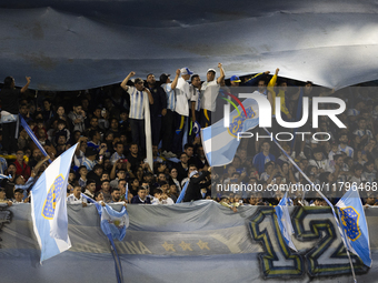 Argentina fans are in the stands before the 2026 FIFA World Cup South American qualifiers football match between Argentina and Peru at the L...