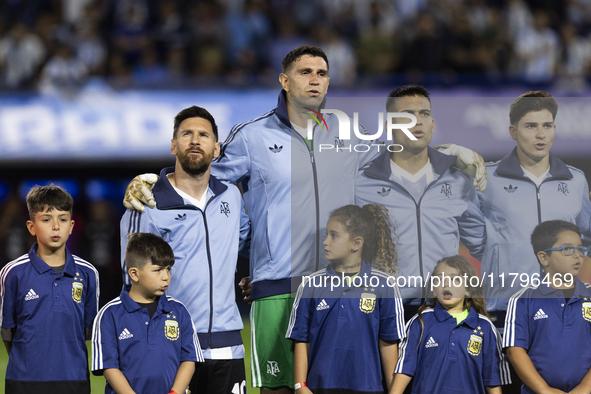 Argentina's Lionel Messi, Emiliano Martinez, Lautaro Martinez, and Julian Alvarez stand before the 2026 FIFA World Cup South American qualif...