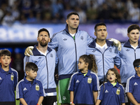 Argentina's Lionel Messi, Emiliano Martinez, Lautaro Martinez, and Julian Alvarez stand before the 2026 FIFA World Cup South American qualif...