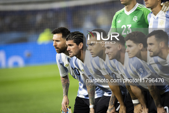 Argentina's Lionel Messi and teammates stand before the 2026 FIFA World Cup South American qualifiers football match between Argentina and P...