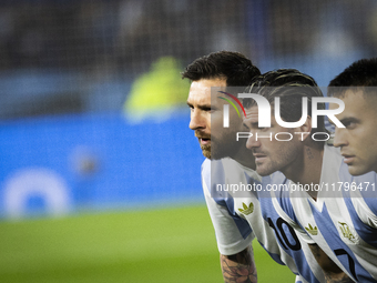 Argentina's Lionel Messi, Rodrigo De Paul, and Lautaro Martinez stand before the 2026 FIFA World Cup South American qualifiers football matc...