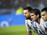 Argentina's Lionel Messi, Rodrigo De Paul, and Lautaro Martinez stand before the 2026 FIFA World Cup South American qualifiers football matc...