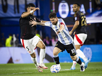 Argentina's Lionel Messi is in action during the 2026 FIFA World Cup South American qualifiers football match between Argentina and Peru at...