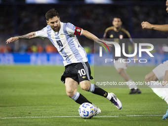 Argentina's Lionel Messi is in action during the 2026 FIFA World Cup South American qualifiers football match between Argentina and Peru at...